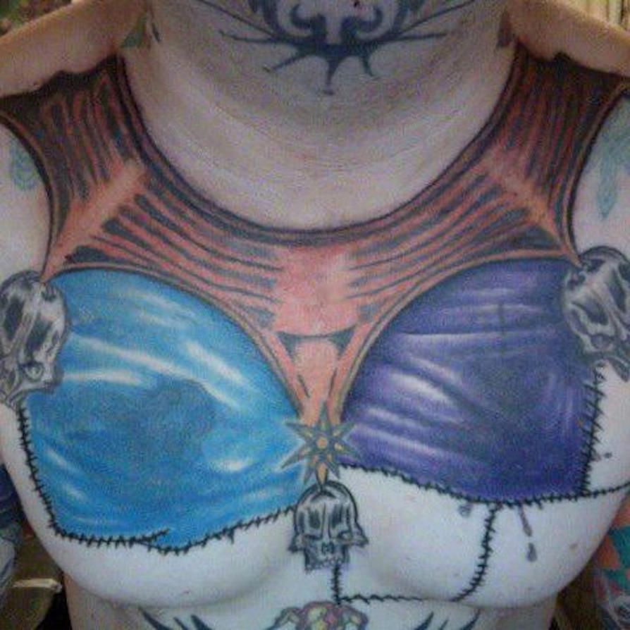 jester-collar-and-jester-colored-patchwork-tattoo-by